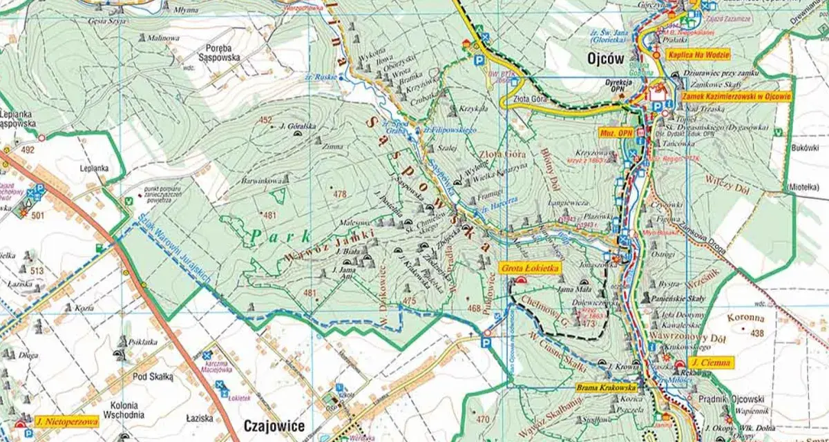 Najmniejszy park narodowy w Polsce, Ojcowski, to labirynt wapiennych skał, jaskiń i wąwozów. Na mapie zaznaczono szlaki turystyczne i punkty widokowe.