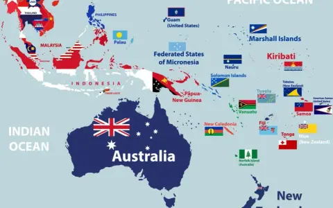 Mapa przedstawia państwa w Oceanii i Azji Południowo-Wschodniej, z zaznaczonymi flagami i nazwami krajów, w tym Australii i Nowej Zelandii.