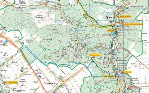 Najmniejszy park narodowy w Polsce, Ojcowski, to labirynt wapiennych skał, jaskiń i wąwozów. Na mapie zaznaczono szlaki turystyczne i punkty widokowe.